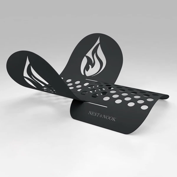 Black steel fire pit with flame cutout panels and perforated holes, "NEST & NOOK" logo