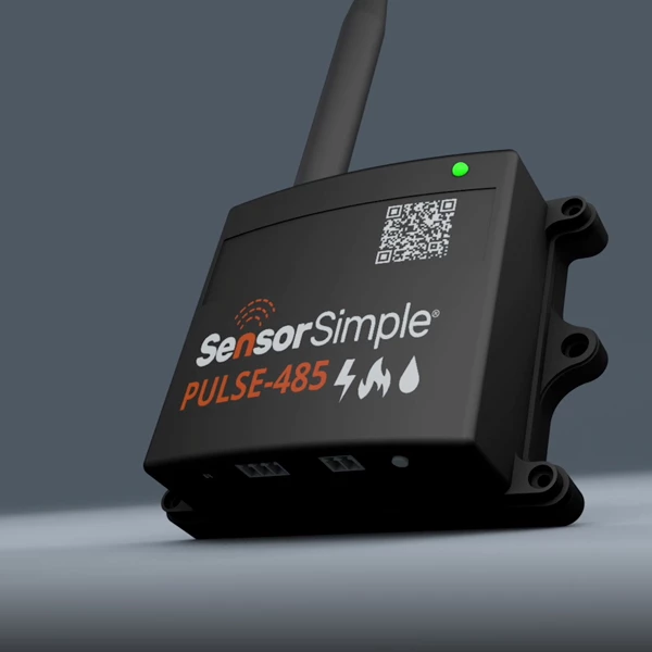 SensorSimple PULSE-485 black wireless sensor module with antenna and QR code, product shot on a dark gray studio backdrop