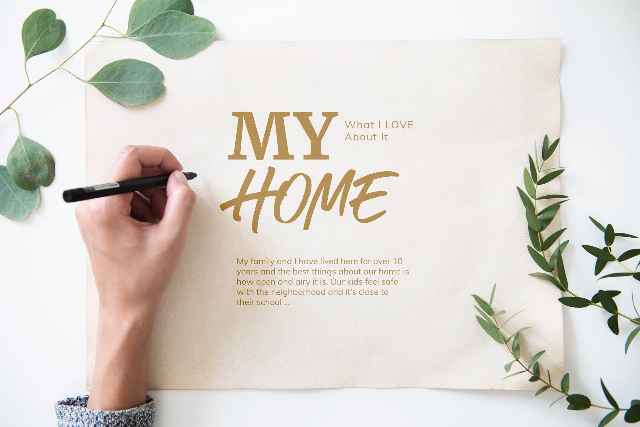 Flat-lay mockup of a cream textured paper page with gold headline "MY HOME" and "What I LOVE About It" subtitle