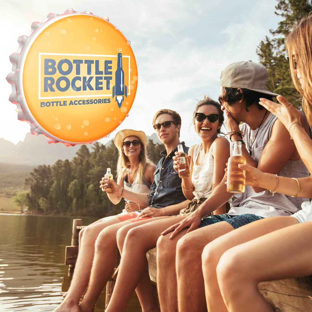Friends sharing beers on a lakeside dock with Bottle Rocket orange bottle-cap logo overlay